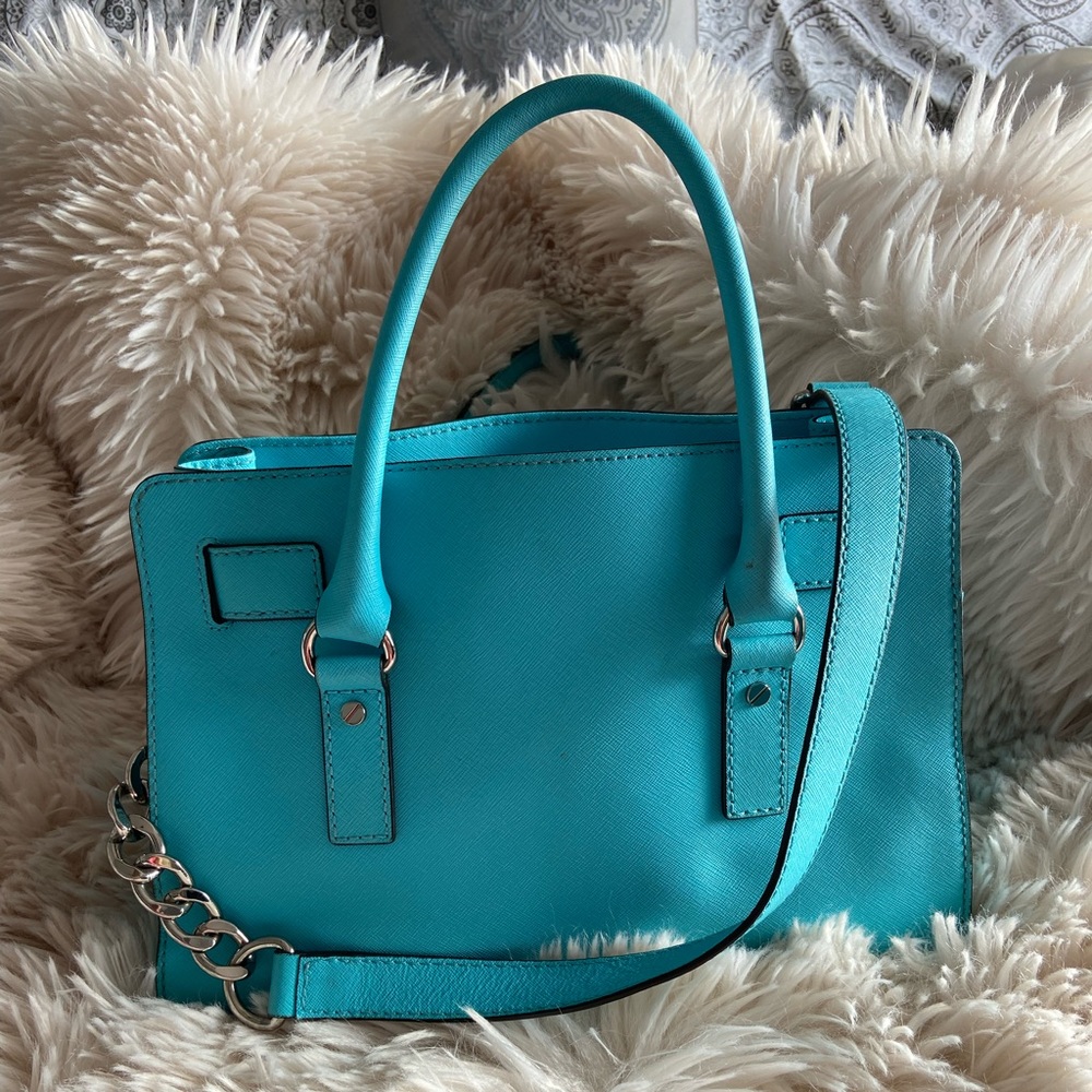 A beautiful turquoise with silver hardware Michael Kors purse. - Picture 7 of 7
